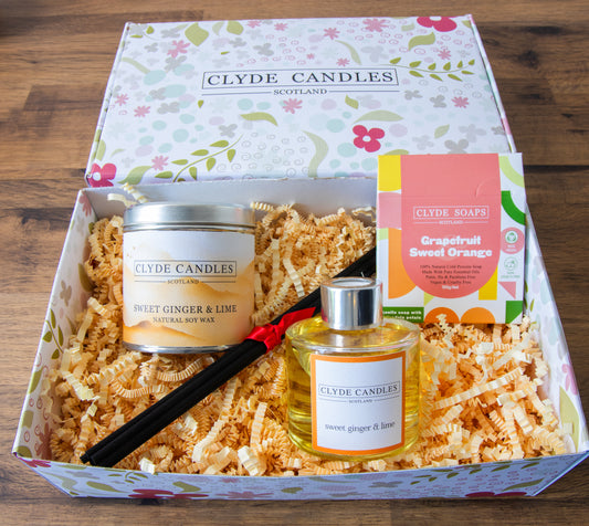 Clyde Candles gift set with a soy candle tin, reed diffuser and natural soap bar