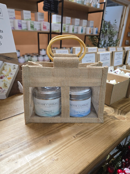 Gift bag with two scented candle tins from Clyde Candle