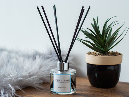Rain Water Reed Diffuser - Clyde Candles, Luxury Diffuser Oil with a Set of 7 Fibre Sticks, 100ml, Best Aroma Scent for Home, Kitchen, Living Room, Bathroom. Fragrance Diffusers set with sticks